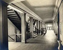 Children line up in a hallway at Riverview Lab School, St. Cloud State University, 1913