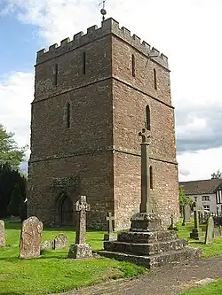 Bell tower and churchyard cross