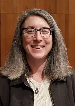 Cohn smiling to the camera