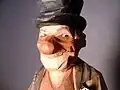 Closeup of face Woodcarving of a hobo by Carl Johan Trygg circa 1940s