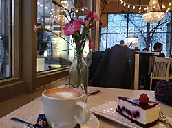 Image 51A cup of coffee with cheesecake at a cafe in Helsinki, Finland (from Coffee culture)