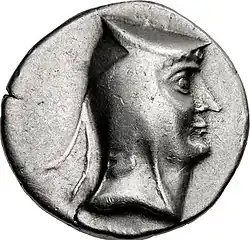 3rd century BC coin of Arsaces I of Parthia with a Bashlyk on
