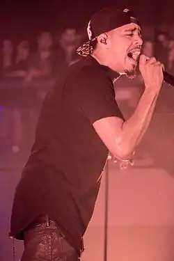 J. Cole at a promotional show for Born Sinner