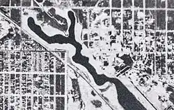 Black-and-white photograph of a channel from above