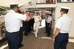 USCG Sideboys greet a dignitary aboard Eagle