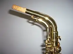 Close-up view of neck with underslung octave key mechanism (no microtuner) on a Conn 6M "Lady Face" alto saxophone