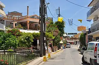A street in Gouvia with bars and restaurants to serve the tourist market