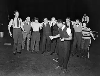 Yates rehearsing the cast