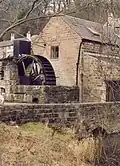 A mid-nineteenth century water wheel for a mill grinding locally mined barytes. It is no longer used for any purpose but can be seen turning on occasion.