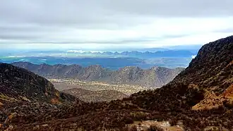 A view of Parishan Lake from the top of the mountains of Dasht-e Barm forest