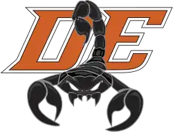 A menacing scorpion in front of an orange sans-serif "DE"