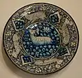 Dish with running quadrupeds