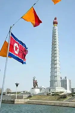 A North Korean flag flies near the Juche Tower in Pyongyang