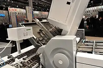 The same buckle plate folder with open folding unit