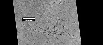 Rootless Cones, as seen by HiRISE under HiWish program. These group of rings or cones are believed to be caused by lava flowing over water ice or ground containing water ice.[4][5] The ice quickly changes to steam which blows out a ring or cone.