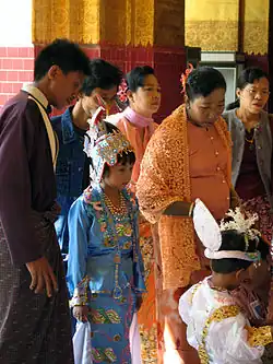 Image 22An ear-piercing ceremony at Mahamuni Buddha in Mandalay (from Culture of Myanmar)