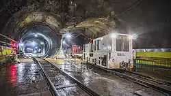 A tunnel cavern located north of Grand Central Madison, with two tubes diverging from the cavern. As part of the East Side Access project, a railroad switch was installed within the cavern, connecting the tracks that run through the tubes.
