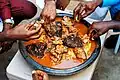 A family eating fufu