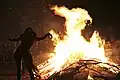 The Bonfire lit to welcome the Beltane morning with a ritual dancer