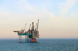 Photo of an oil rig at sea