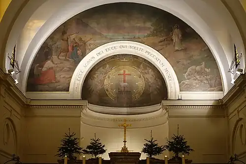 Mural in choir over the altar, "Preaching of John the Baptist by the Jordan River" (left) and "Entry of Christ into Public Life" )right) by Henri Nozais (1928)