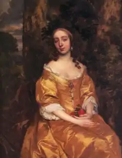 A full-length portrait of Lady Chesterfield sitting, wearing a golden dress