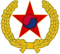 First emblem of the Korean People's Army used from February 1948, the taeguk was dropped several months later.