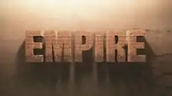 Series title in brickwork against cracked sand back