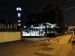 Entrance E of Zongguan station (outside, at night)