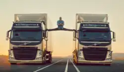 Jean-Claude Van Damme doing his gymnastic split in the commercial between two Volvo FM series trucks