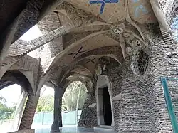 Complex system of supports at the entrance of the church at Colònia Güell