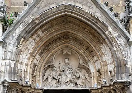 Reassembled portal tympanum on the church of Saint-Séverin.