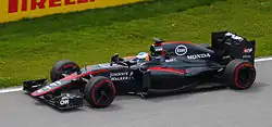 Fernando Alonso driving the McLaren MP4-30 at the 2015 Canadian Grand Prix.