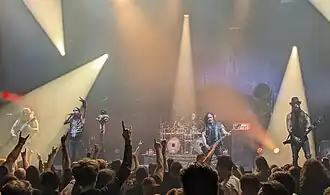 Finntroll performing in 2024