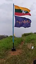 The flag of Myanmar flown alongside the flag of Tanintharyi Region[clarification needed] on 1199 Mountain Peak in Kawthaung.