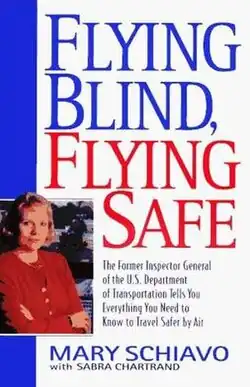 Cover has a small head and shoulders photo of the author, a short-haired blond woman with arms folded.