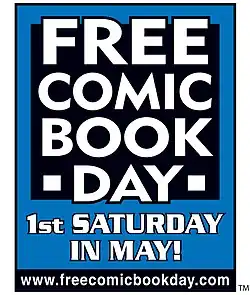 White block letters on a blue-and-black background reading: Free Comic Book Day – 1st Saturday in May
