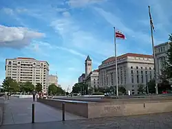 Looking southeast across Freedom Plaza towards Pennsylvania Avenue and the Old Post Office Building, with the United States Capitol in the background in 2009