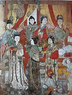 Women depicted in the Fresco in the Hall of King Mingying. Han women wore elbow-length sleeves, cross-collar upper garment over a long-sleeved blouse; the abbreviated skirts were popular in Yuan.[21]