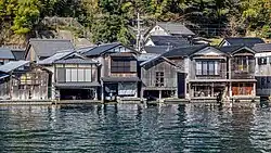 The Funaya that seem to float on the sea.