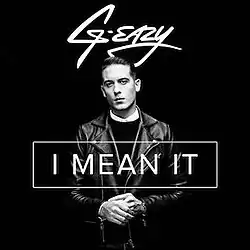 A black-and-white image of a man wearing a black shirt and leather jacket. The artist's logo appears above him and the song title appears in front of him inside a rectangle, both colored in white.