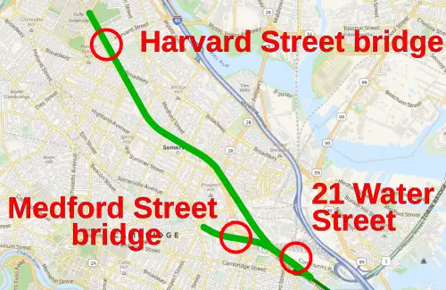 A map of the GLX corridor with the Medford Street bridge, Harvard Street bridge, and 21 Water Street circled
