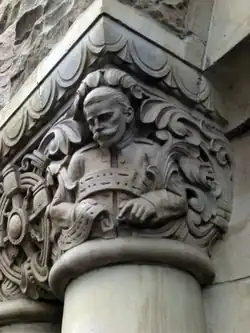 The telegraphist, facade capital indicating the communications office.