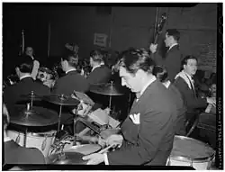 Gene Krupa playing two splash cymbals