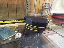 Train conductors hat and watch.