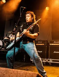 Guitarist Josh Hardy, performing live in 2022