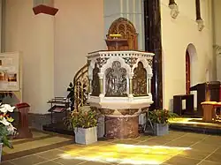 The ornate raised pulpit