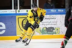 Carl Hudson playing ice hockey for GKS Katowice