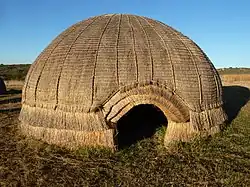 A reconstruction in a heritage site of KwaZulu-Natal of the Zulu people's variation of a hut called iQhugwane, which dominated as an indigenous abode during Dingane kaSenzangakhona's reign.