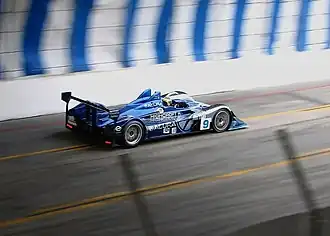 An Acura sports car on a street circuit